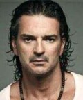 Doble Oficial de Ricardo Arjona