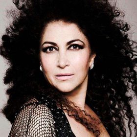 Doble oficial de Amanda Miguel